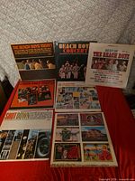 Seven Beach Boys record albums laid out