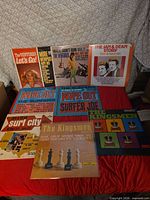 All nine LP jackets laid out on table, showing fronts and titles