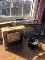 Lot overview showing two boxed frames, rectangular bin, flat tray and round pen cup