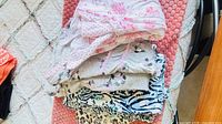 Stack showing all five nightwear items
