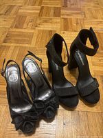 Both pairs of shoes side by side