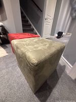 Olive green cube ottoman close view