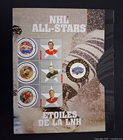 Front of the 2001 Canada Post NHL All-Stars stamp folder showing three stamps and bilingual title