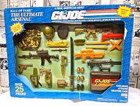 Front view of sealed G.I. Joe Hall of Fame The Ultimate Arsenal box showing all accessories through blister