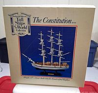 Front of collector box showing image and specifications of model ship