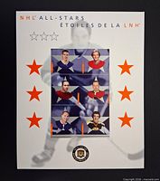 Front of folder showing six-stamp pane and NHL All-Stars graphics