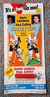 Front of sealed blister card showing booklet and skate sharpener