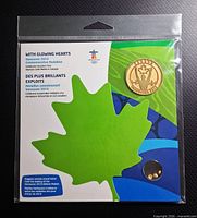 Front view of sealed packaging showing medallion and graphic card