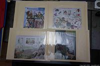 Four souvenir sheets in album sleeves, top left parrots (Paraguay), top right insect theme, bottom left Mozambique Alexander von Humboldt, bottom right Guinea art sheet