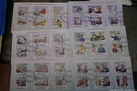 Mozambique souvenir sheets featuring explorers and scientists