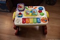 Full view of VTech 2-in-1 Discovery Table on legs