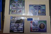 Four souvenir sheets including parrots, sailing ships and Lesotho portrait sheet