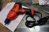 Full view of Black & Decker corded drill with cord