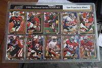 Front view of plastic page showing ten 1991 Action Packed San Francisco 49ers football cards