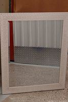 Front view showing entire mirror and frame