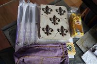 Overview showing knives, plaque, boxed infuser, fan sleeve