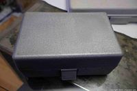 Closed grey plastic tool case
