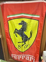Full view of Ferrari flag showing emblem and overall condition