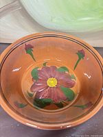 Interior view showing floral motif and glaze