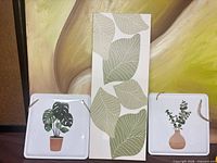 Group shot of three wall pieces showing relative sizes and designs