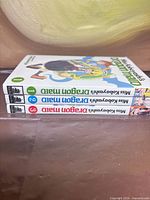 Spine view of all three volumes showing titles and volume numbers 1-3