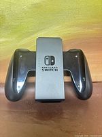 Front view showing Nintendo Switch logo and overall condition