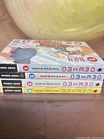 Spines of all four Oreimo volumes 1-4 showing publisher logo and numbering
