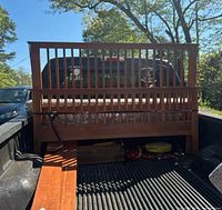 Headboard and footboard assembled in truck bed