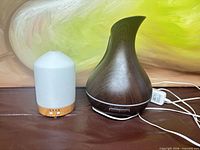 Both diffusers side by side showing overall shapes and cords