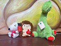 All three plush toys together