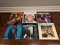 Group shot of all six vinyl LPs with front covers visible