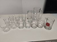 Group shot of entire lot showing quantity and types of glassware