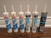 Front view of all six tubes in lot