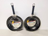 Front view of both 12-inch stir-fry pans packaged