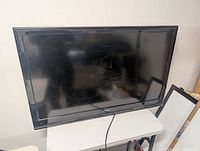 Front view of Insignia flat-panel TV showing screen and bezel