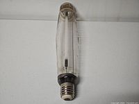 Full view of clear glass metal halide bulb