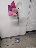 Full view of floor lamp showing five shades, base and cord