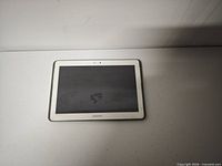 Front view of Samsung Galaxy Tab tablet with black screen and white bezel