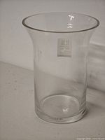 Flared-rim clear glass vase front view