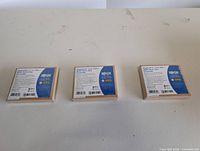 Three sealed Tripp Lite converter boxes