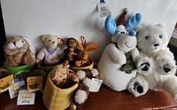 All plush toys and holders grouped