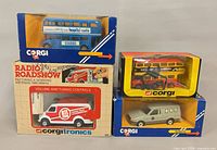 Group shot of four boxed Corgi vehicles
