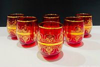 Set of six ruby red gilt glasses front view
