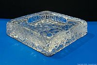 Perspective view showing square ashtray and textured ice glass exterior