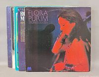Front of stack showing Flora Purim Stories to Tell with other albums partially visible