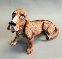 Front angled view of ceramic basset hound figurine