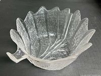 Top view of clear crystal leaf-form bowl showing textured surface and leaf veins