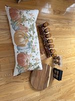 Group shot of entire lot: pillow, candelabra with votives, lazy Susan, napkin rings, pie server, napkins