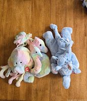 Group shot of all six Ty Beanie Babies arranged on table