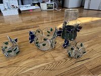 Group shot of all four butterfly candle holders